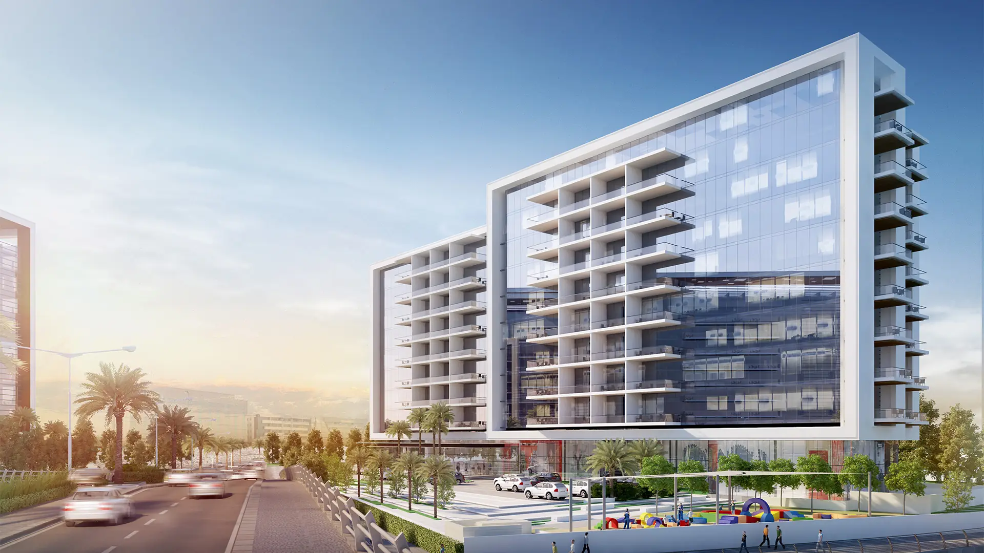 Gateway Residences II – framed apartment building with balconies beside a palm-lined road