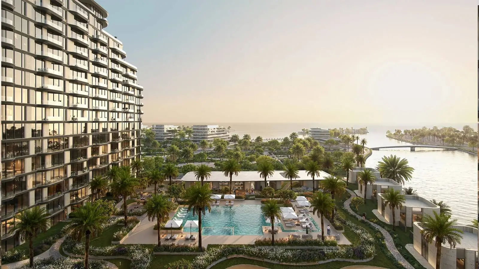 Mirasol – residential building overlooking a landscaped pool area and the water